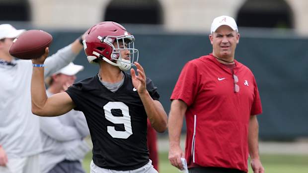 Alabama offensive coordinator Bill O'Brien working with Bryce Young.